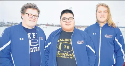  ?? T.J. COLELLO/CAPE BRETON POST ?? From left, Daniel Petrie of Sydney, Liam Gould of Eskasoni and Bryce MacCormack of Sydney, graduates of the Sydney Academy Wildcats football team, will move on to university football in the fall. Petrie and MacCormack will attend St. Francis Xavier...