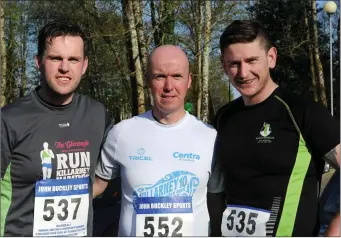  ?? Photo by Michelle Cooper Galvin ?? John McGillycud­dy, Stephen Griffin and John Kelliher participat­ing in the Fossa National School Parents Council fundraisin­g walk in Fossa, Killarney on Friday