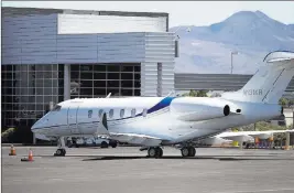  ?? Erik Verduzco ?? Las Vegas Review-journal @Erik_verduzco A private airplane Tuesday at the Signature Flight Support facility at Mccarran Internatio­nal Airport.