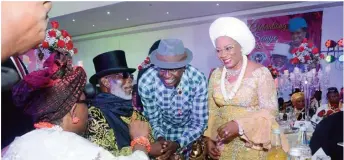  ??  ?? High Chief (Dr.) O. B. Lulu-briggs OON, in a warm handshake with Dr. Dawari George, with Dr. (Mrs.) Seinye O.b.lulu-briggs, at Mrs. Briggs 60th birthday, last week.