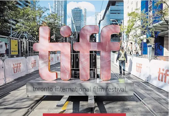  ?? CHRIS YOUNG THE CANADIAN PRESS ?? The organizati­on that runs the Toronto Internatio­nal Film Festival says the impact of COVID-19 is forcing more layoffs and slashing expected revenues.