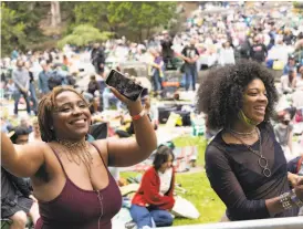  ?? Paul Kuroda / Special to The Chronicle ?? Dan Carroll (left) and Zakiya Zazaboi dance to music by the Seshen at the opening show of this year’s Stern Grove Festival.