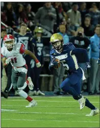  ?? Special to the Democrat-Gazette/JIMMY JONES ?? Pulaski Academy receiver John David White (5) runs for a touchdown Friday during the Bruins’ 58-8 victory over Little Rock McClellan in the Class 5A quarterfin­als. Pulaski Academy will host Harrison next week in the semifinals.