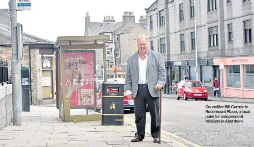  ??  ?? Councillor Bill Cormie in Rosemount Place, a focal point for independen­t retailers in Aberdeen