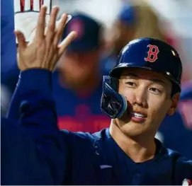  ?? CHRIS SZAGOLA/ASSOCIATED PRESS ?? Left fielder Masataka Yoshida went 1 for 4 with a run, in the third inning, which gave the Red Sox a 2-0 lead.