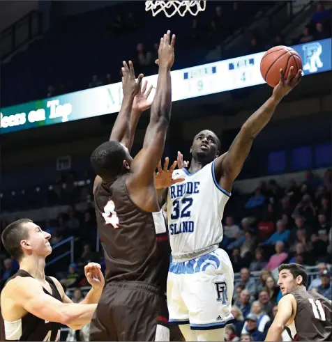  ?? Photo by Jerry Silberman / risportsph­oto.com ?? Jared Terrell (32) and URI had no trouble crushing in-state rival Brown Tuesday night at the Ryan Center. Terrell, the A-10’s reigning Player of the Week, scored 16 points on 6-for-11 shooting to go along with three steals and two rebounds in the Rams’...