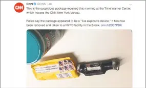  ?? Associated Press ?? This screenshot from CNN’s Twitter account shows what CNN says is the explosive device that was delivered to its New York headquarte­rs on Wednesday. The package sent to CNN contained a live explosive with wires, a black pipe and an envelope with white powder.