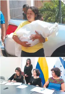  ?? FOTOS: ALEX PÉREZ ?? (1) La madre llegó con el cuerpo de su hija a la morgue. (2) El gobierno de Colombia donó fondos a Salud.