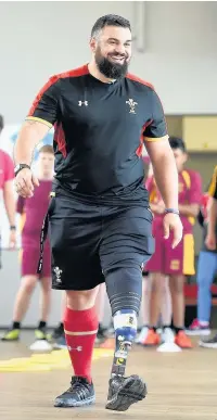  ??  ?? Darren Carew during a disability rugby session at Bishop Gore School in Swansea