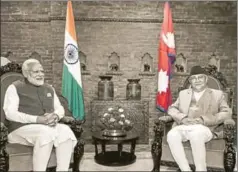  ?? PTI ?? Prime Minister Narendra Modi with his Nepali counterpar­t KP Sharma Oli during delegation­level talks in Kathmandu on May 11