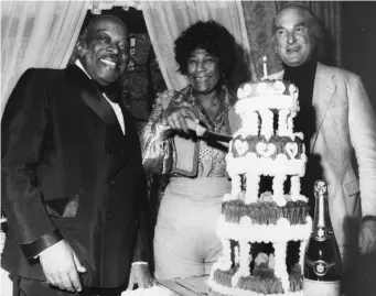  ??  ?? Ella celebrates her birthday with Count Basie (left) and manager Norman Granz in 1971 (Getty)