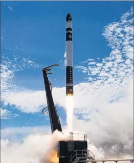  ?? Rocket Lab via Associated Press ?? BY USING smaller rockets from start-ups such as Rocket Lab, makers of small satellites can pick their launch time and orbit placement. Above, Rocket Lab’s Electron rocker lifts off Sunday from New Zealand’s Mahia Peninsula.