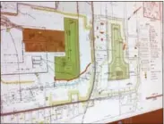  ?? EVAN BRANDT — DIGITAL FIRST MEDIA ?? The map from Gibraltar Rock’s testimony March 2 shows the original quarry plan on the left, which has already been granted zoning approval, and the newer plan, known as GR-IV on the right. Hoffmansvi­lle Road runs between the two proposed pits and...