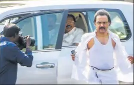  ??  ?? DMK working president MK Stalin displays his torn shirt after the chaos inside Tamil Nadu legislativ­e assembly in Chennai on Saturday. n PTI