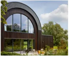  ??  ?? Below & left: In order to attain planning consent for this modern new home, Clear Architects made sure the structure sat within the footprint of the barn that originally occupied the site