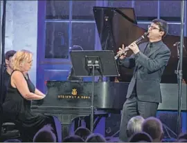  ?? Allen J. Schaben Los Angeles Times ?? BERNADENE BLAHA on piano and Boris Allakhverd­yan on clarinet perform Brahms’ Clarinet Sonata No. 1 in F minor, Op. 120, in South Pasadena on Monday.