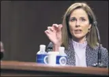  ?? ANNA MONEYMAKER — THE ASSOCIATED PRESS ?? Supreme Court nominee Amy Coney Barrett speaks during a confirmati­on hearing before the Senate Judiciary Committee, Wednesday, Oct. 14, on Capitol Hill in Washington.