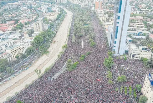  ??  ?? HISTORIC RALLY: An aerial view shows thousands of people protesting in the streets of Santiago, Chile on Friday.