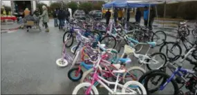  ?? FRAN MAYE - DIGITAL FIRST MEDIA ?? These bikes await new owners during the Christmas basket program Saturday in New Garden.