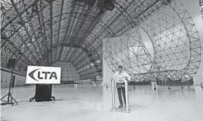  ?? PHOTOS BY MIKE CARDEW/AKRON BEACON JOURNAL ?? Alan Weston, CEO of LTA Research, talks about bringing airships back to Akron.