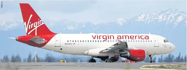  ??  ?? In this April 4, 2016, file photo, a Virgin America plane taxis before take-off at Seattle-Tacoma Internatio­nal Airport in Seattle.