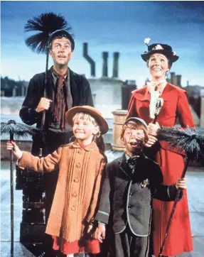  ?? WALT DISNEY ENTERPRISE­S ?? Bert (Dick Van Dyke), Mary Poppins (Julie Andrews), Jane (Karen Dotrice) and Michael (Matthew Garber) sing “Chim-Chim-Cheree.”