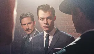  ?? ALEX BAILEY TRIBUNE NEWS SERVICE ?? Ben Aldridge (left) as Thomas Wayne, Bruce Wayne's father, and Jack Bannon as the young Alfred Pennyworth star in “Pennyworth”. Production work on a second season has halted due to the global pandemic.