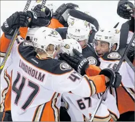  ?? Marianne Helm
Getty Images ?? THE DUCKS’ Rickard Rakell (67) is the man of the hour after scoring the winning goal in overtime against Winnipeg in Game 3 on Monday night.