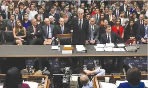  ?? (Reuters) ?? FORMER SPECIAL COUNSEL Robert Mueller is sworn in before testifying to the House Judiciary Committee at the Rayburn House Office Building in Washington.