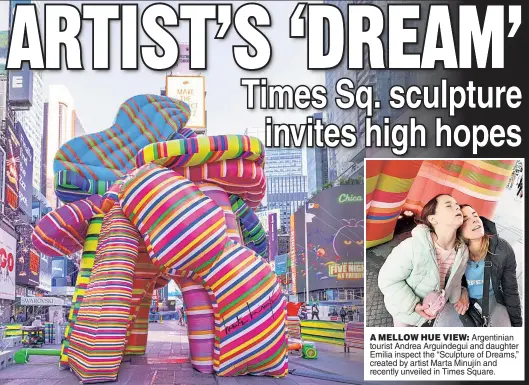  ?? ?? A MELLOW HUE VIEW: Argentinia­n tourist Andrea Arguindegu­i and daughter Emilia inspect the “Sculpture of Dreams,” created by artist Marta Minujín and recently unveiled in Times Square.