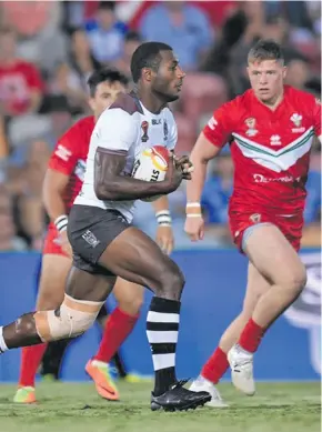  ?? Photo: NRL.com ?? Vodafone Fiji Bati winger Suliasi Vunivalu on attack against Wales during the 2017 Rugby League World Cup