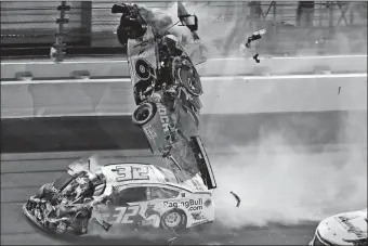  ?? CHRIS O’MEARA/AP PHOTO ?? In this Feb. 17 file photo, Ryan Newman (6) goes airborne after crashing into Corey LaJoie (32) during the NASCAR Daytona 500 at Daytona Internatio­nal Speedway in Daytona Beach, Fla.