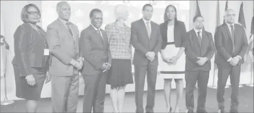  ??  ?? Photo includes the Head of the Internatio­nal Monetary Fund, Christine Lagarde (fourth from left) , PM of Jamaica Andrew Holness (fifth from left), PM of Grenada Keith Mitchell (third from left), Premier of Nevis Vance Amory (second from left).