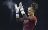  ?? SUE OGROCKI — THE ASSOCIATED PRESS FILE ?? Oklahoma gymnast Maggie Nichols reacts after her routine on the uneven bars in the Perfect 10Challeng­e at the Bart and Nadia Sports Experience in Oklahoma City on Feb. 16, 2019.