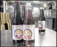  ?? AP ?? Samples of Avery’s Beverages’ latest specialty sodas, Trump Tonic and Hillary Hooch, stand at the bottling facility.
