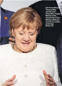  ??  ?? UK Prime Minister Theresa May and German Chancellor Angela Merkel at the second day of the Western Balkans summit in London yesterday. Photo: PA