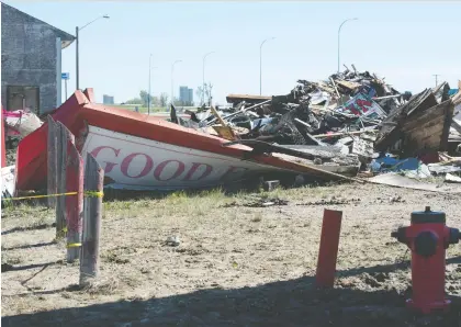  ?? BRANDON HARDER ?? What remains of the Good Fortune Kitchen lays in rubble Monday in Balgonie, following Sunday’s fire that destroyed the building.