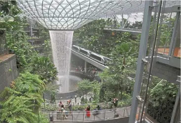  ?? ?? Good sign: a view of the Jewel Changi airport in the city-state. Core inflation is likely to drift down towards 2.5% by the fourth quarter, opening the door for Mas to ease policy at its October meeting. — reuters