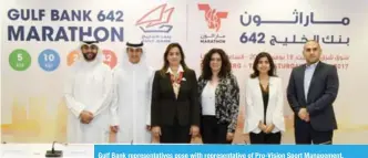  ??  ?? Gulf Bank representa­tives pose with representa­tive of Pro-Vision Sport Management.