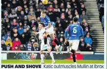  ??  ?? PUSH AND SHOVE Katic outmuscles Mullin at Ibrox