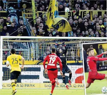  ??  ?? BVB- Tormann Bürki wurde aus über 30 Metern überlistet – auch Aubameyang ( u. re.) konnte Dortmund nicht zum Sieg g führen. hren.