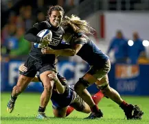  ??  ?? First fiveeighth Ruahei Demant and the Black Ferns eventually had reason to smile against France in Toulon.