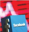  ??  ?? A 3D-PRINTED Facebook logo is seen in front of a displayed stock graph in this illustrati­on taken Nov. 3, 2016.