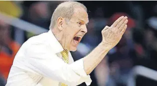  ??  ?? Michigan coach John Beilein yells to his team during the second half on Thursday.