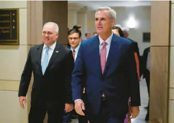  ?? PATRICK SEMANSKY/AP ?? House Minority Leader Kevin McCarthy, R-Calif., right, and Minority Whip Steve Scalise, R-La., will serve as the next speaker and majority leader in the House, leading what is expected to be its slimmest majority in two decades.