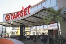  ?? Justin Sullivan / Getty Images ?? CEO Brian Cornell says that Target needs to focus on delivering both value and innovation. Many Target stores, including this one in Los Angeles, have added the option of online order pickup.