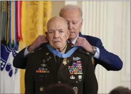  ?? EVAN VUCCI — THE ASSOCIATED PRESS ?? President Joe Biden awards the Medal of Honor to retired Army Col. Paris Davis on Friday.