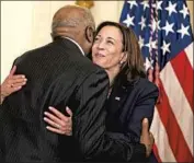  ?? Demetrius Freeman Washington Post ?? REP. JAMES E. CLYBURN and Vice President Kamala Harris celebrate at the Juneteenth bill’s signing.