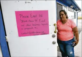  ?? DAVID BECKER PHOTOS / GETTY IMAGES ?? Proprietor Connie West posted a sign on her front door at the Little A’le’Inn restaurant and gift shop last week in Rachel, Nevada. West said her phone has been ringing off the hook since a Facebook event titled, “storm Area 51, They Can’t Stop All of Us,” was posted.