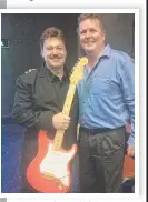  ??  ?? Greg Doolan and Shane Veen at Twin Towns after Doolan’s
Cliff and The Shadows show. The guitar was formerly owned by Hank Marvin.